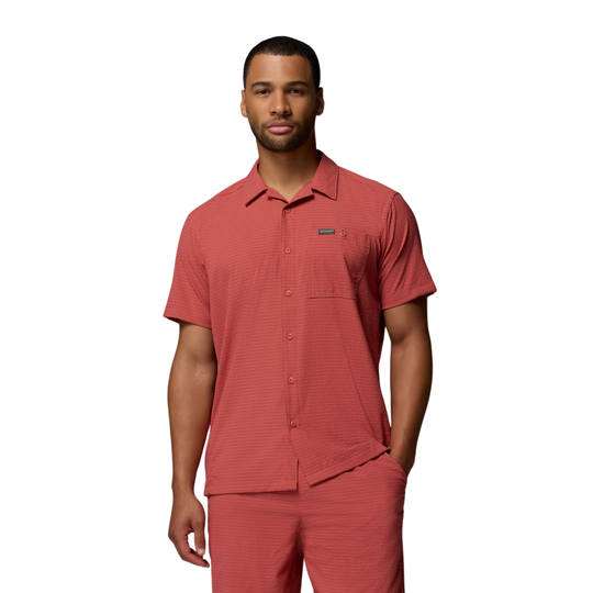 man wearing Columbia Men's Utilizer Short Sleeve Camp Shirt - Washed Red on white background