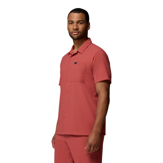 side view of man wearing Columbia Men's Utilizer Short Sleeve Camp Shirt - Washed Red on white background