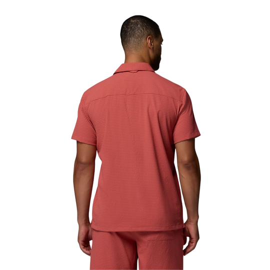 back of man wearing Columbia Men's Utilizer Short Sleeve Camp Shirt - Washed Red on white background