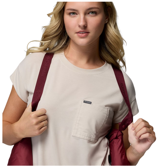 Woman wearing Columbia Women's Amaze Puff Hooded Jacket - Rich Wine on a plain white background. Showing off the suspender function. 