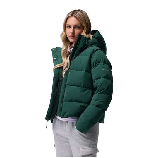 side view of woman wearing Columbia Women's Amaze Puff Hooded Jacket - Rain Forest on plain white background