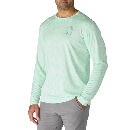 man wearing Carhartt Men's Force Sun Defender Relaxed Long Sleeve T Shirt - Fresh Mint Camo on a plain white background