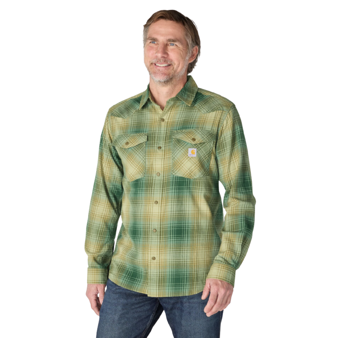 Man wearing Carhartt Men's Montana Rugged Flex Relaxed Fit Lightweight Long Sleeve Plaid Shirt - Faded Fatigue on a plain white background