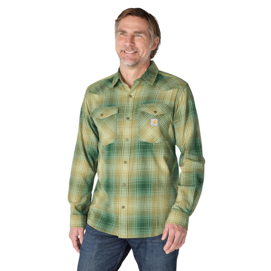 Man wearing Carhartt Men's Montana Rugged Flex Relaxed Fit Lightweight Long Sleeve Plaid Shirt - Faded Fatigue on a plain white background