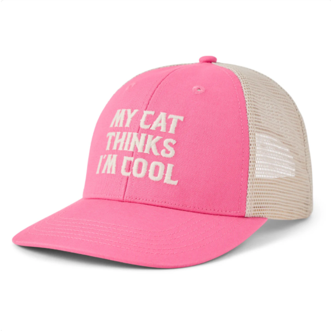 A pink and beige trucker cap with the text 'MY CAT THINKS I'M COOL' embroidered in white on the front panel, shown against a plain white background.