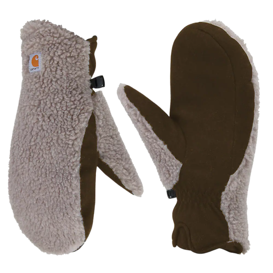 A pair of Carhartt winter mittens shown on a plain white background. One mitten is oriented to show the fluffy sherpa lining in a light taupe-beige color with the Carhartt logo patch, and the other shows the solid dark brown fabric of the palm and finger sections with a contrasting light sherpa trim.