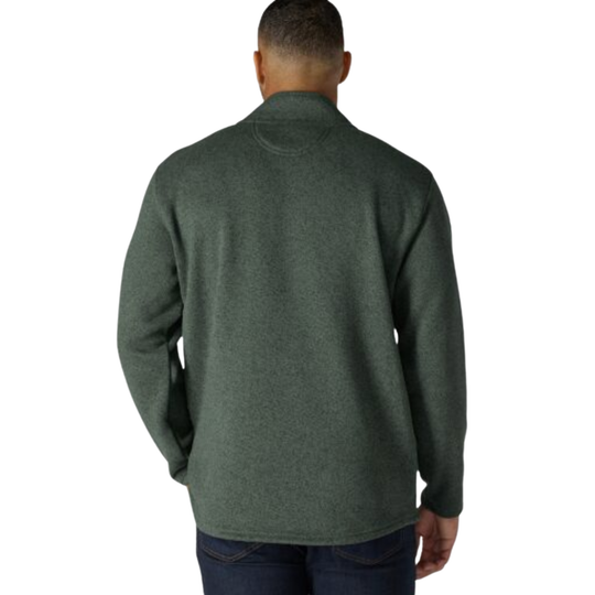 A man viewed from the back wearing a dark green long-sleeve knit sweater and dark blue jeans against a plain white background.