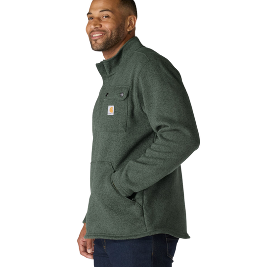 A man wearing a dark green heathered Carhartt quarter-zip fleece sweater, shown in a side profile against a plain white background.