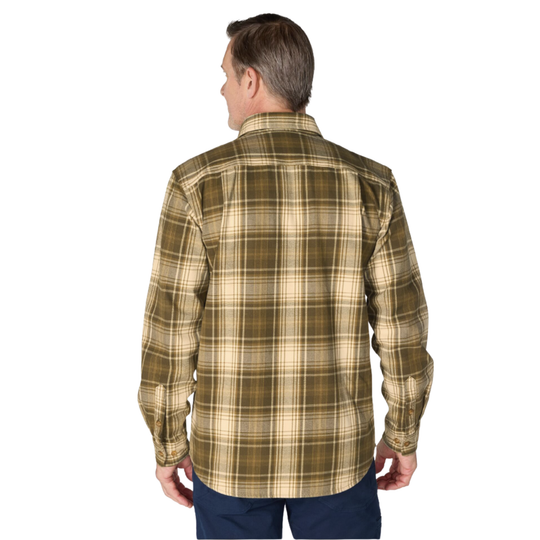 A man viewed from the back wearing a long-sleeve plaid button-up shirt in olive green and beige, paired with navy pants, against a plain white background.