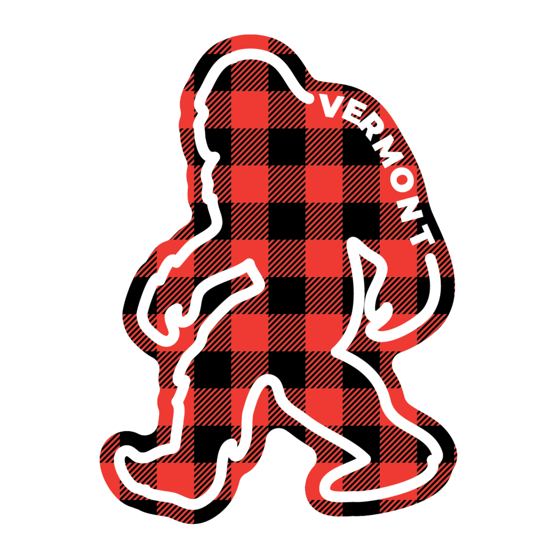 A die-cut sticker or decal featuring a red and black buffalo plaid pattern with a white outline and the word 'VERMONT' in white along the top right, shown on a plain white background.