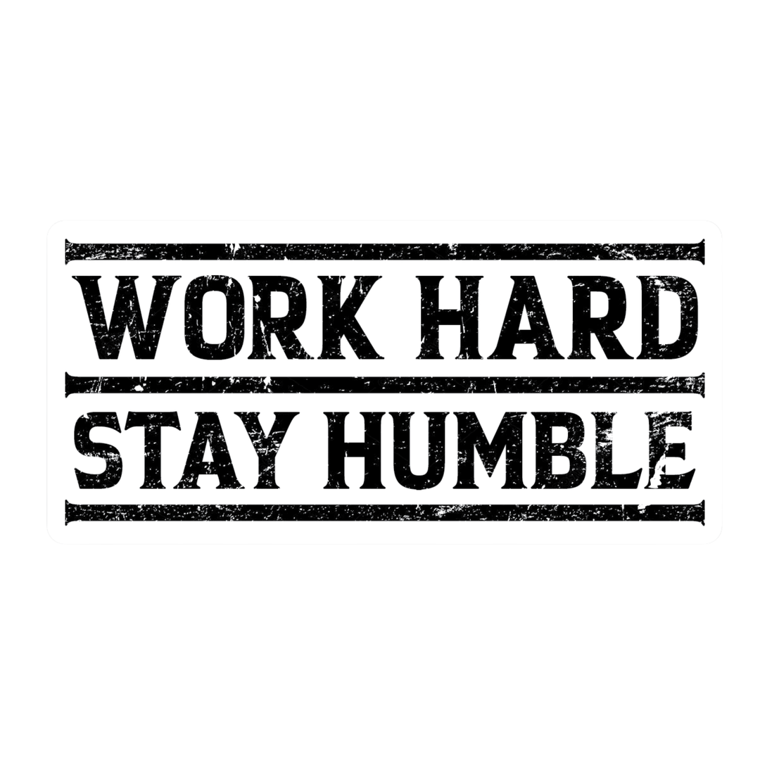 A rectangular black-and-white graphic with the distressed text 'WORK HARD STAY HUMBLE' centered on a white background.