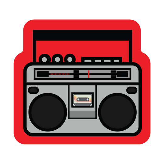 A stylized vector illustration of a vintage boombox radio. The boombox is gray with black details, featuring two large circular speakers, a cassette deck, and a red and black outer shell.