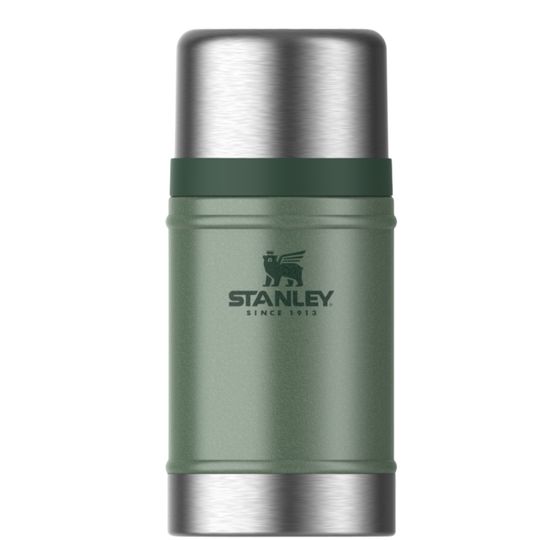 Stanley vacuum insulated stainless steel thermos bottle in sage green with a dark green band and silver metal top and bottom, shown on a white background.