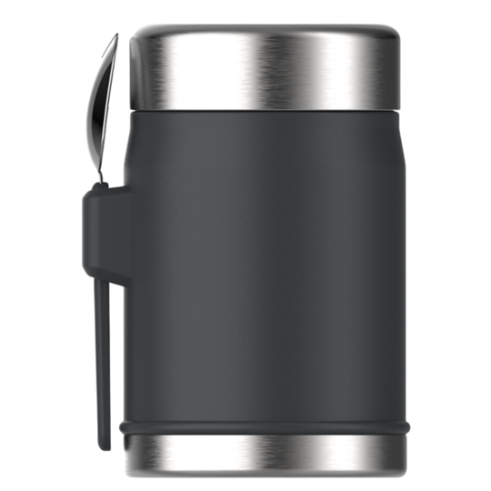 A matte black insulated can cooler with a brushed stainless steel lid and base, featuring a side clip holding a metal spoon, shown on a plain white background.