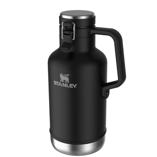 A black Stanley growler with a stainless steel lid and base, featuring a side handle and the Stanley logo on the front, set against a plain white background.