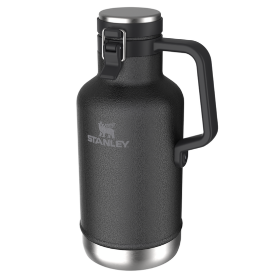 A Stanley growler bottle with a matte black textured finish, featuring a stainless steel lid, base, and handle, shown on a plain white background.