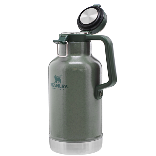 A dark green Stanley growler bottle with a matching handle and lid, featuring a silver stainless steel body and base, shown on a white background.