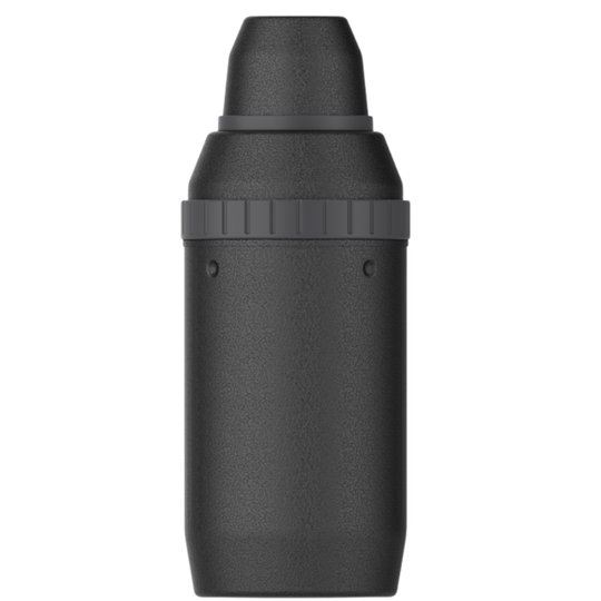 A matte black cylindrical bottle or container with a ribbed band around the middle and a tapered cap, shown against a plain white background.