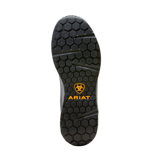 The black rubber outsole of a shoe, featuring a hexagonal tread pattern and the yellow Ariat logo and brand name printed near the center, shown against a plain white background.