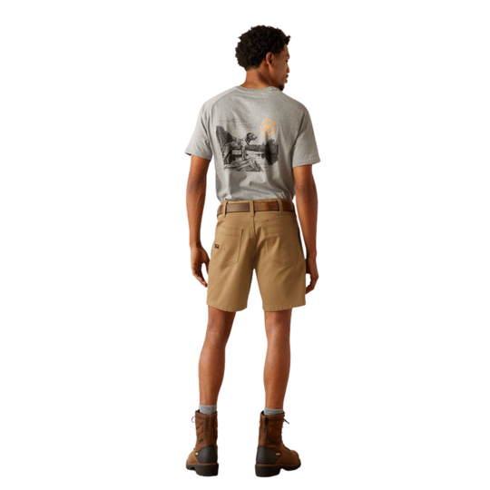 A man shown from the back wearing a light gray graphic t-shirt, tan work shorts, a brown belt, and brown boots against a plain white background.