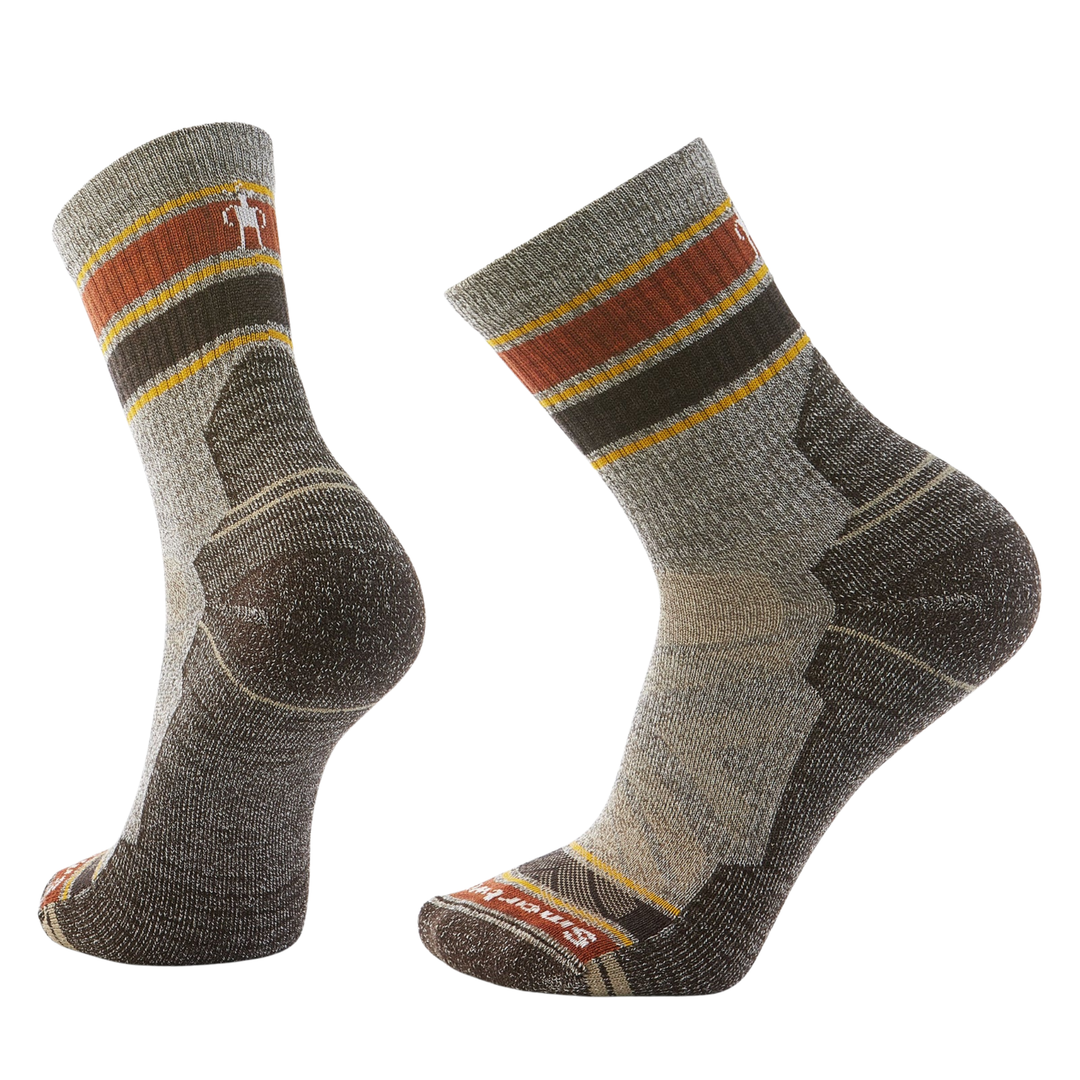 Pair of gray hiking socks with brown and yellow accents on a white background