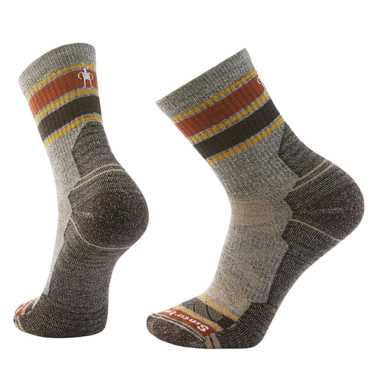 Pair of gray hiking socks with brown and yellow accents on a white background
