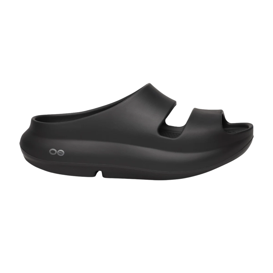 Black sandal with a brand logo on a white background