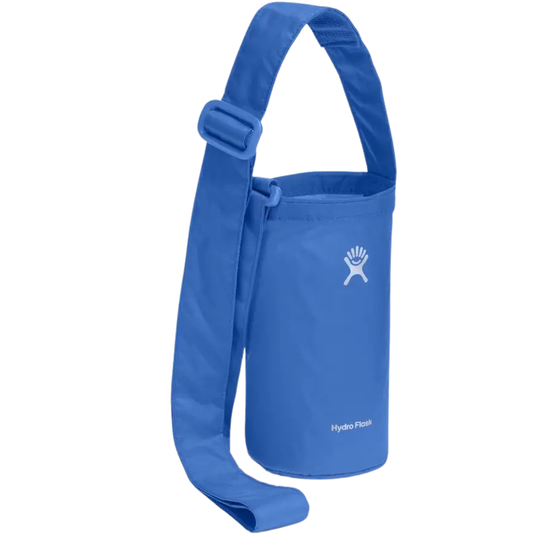 A blue Hydro Flask dry bag shoulder bag with an adjustable strap, shown on a plain white background.
