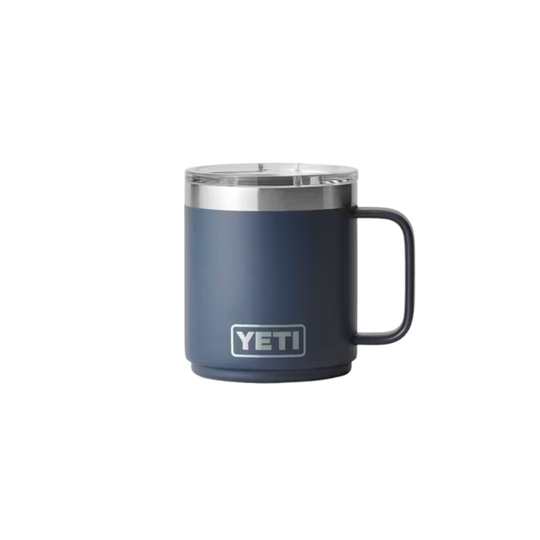 A YETI insulated stainless steel mug in navy blue with a matching navy handle and a clear lid, shown against a plain white background.