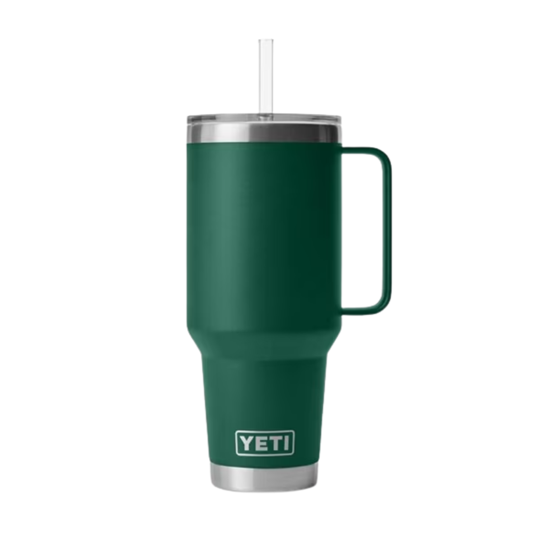 A dark green YETI insulated tumbler with a stainless steel handle, clear lid, and straw, shown against a plain white background.
