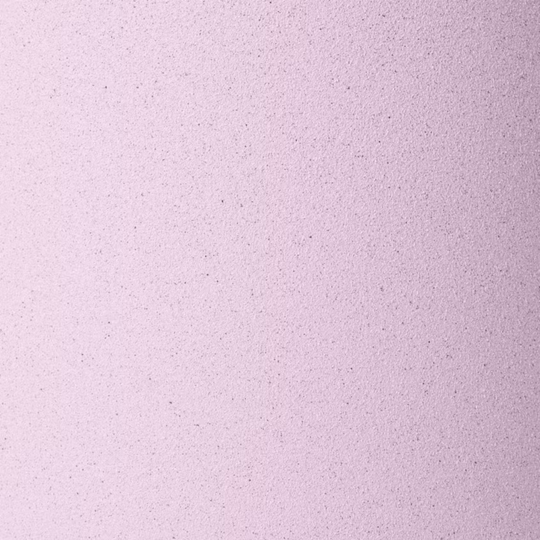 A close-up of a light pink textured material with fine speckles and a subtle gradient from pale pink to slightly deeper pink.