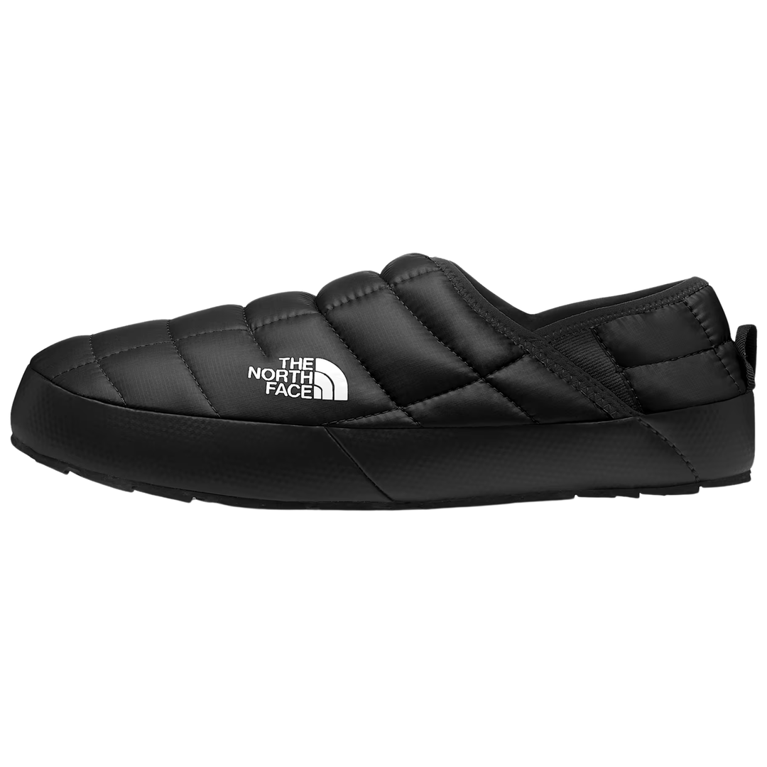 A black quilted slip-on shoe by The North Face, shown in a side profile view against a plain white background.