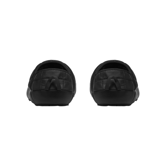 Pair of black loafers with tassels on a white background