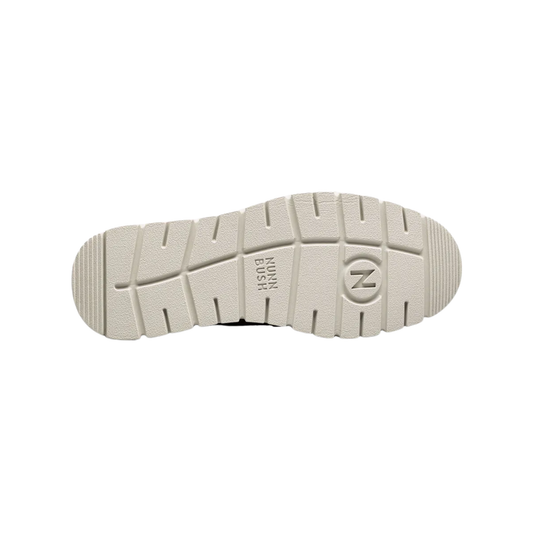The outsole of a beige shoe, showing a textured tread pattern, a circular 'N' logo, and vertical text reading 'NORTH WOOD', on a plain white background.