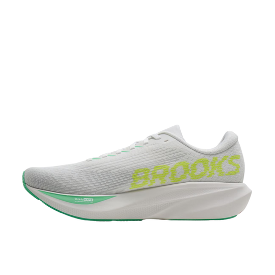 A Brooks running shoe in white with neon yellow-green accents, including the 'BROOKS' branding on the side and a green outsole accent, shown against a plain white background.