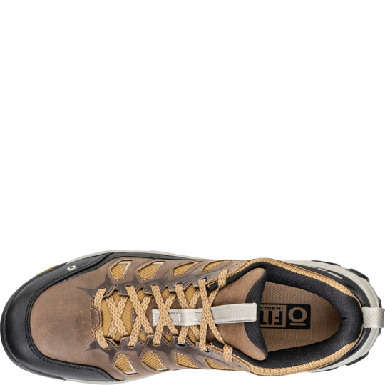 A top-down view of a brown and tan hiking shoe with black accents and a white heel pull tab, shown on a plain white background.