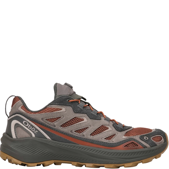 A single Oboz hiking shoe in gray suede and mesh with rust-orange accents, dark gray laces, and a thick dark gray midsole, shown against a plain white background.