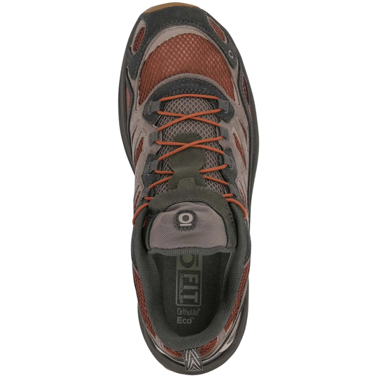 A top-down view of a 5.11 Trail Runner shoe in dark gray and rust orange, featuring mesh panels, orange laces, and the 5.
