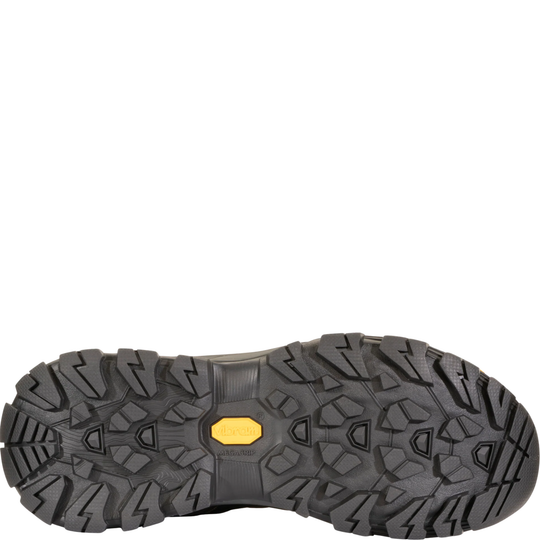 Close-up of a black hiking boot sole with a yellow label on a white background