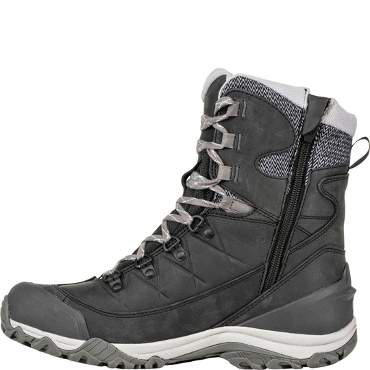 A dark gray mid-calf hiking boot with a side zipper, gray laces, and a white and gray sole, shown from a side profile on a white background.