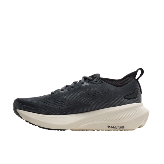 A single black running shoe with a thick, textured off-white midsole and black laces, shown in a side profile on a solid white background. The brand 'Dnataires' is visible on the side of the sole.