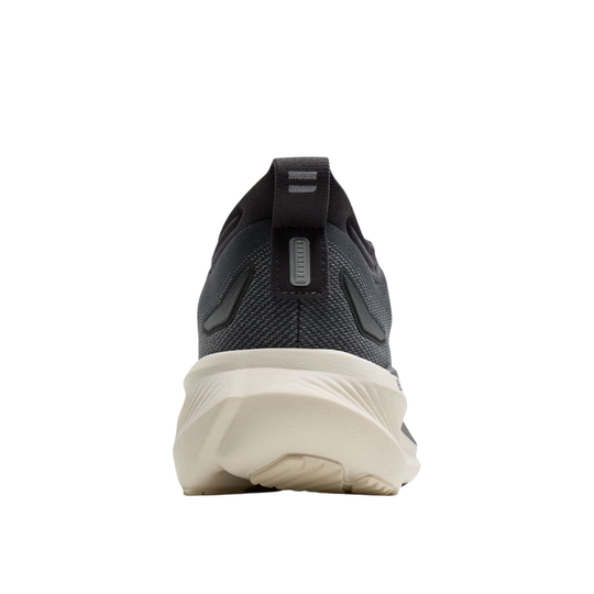 A rear view of a black running shoe with a thick, off-white cushioned sole, shown against a plain white background.