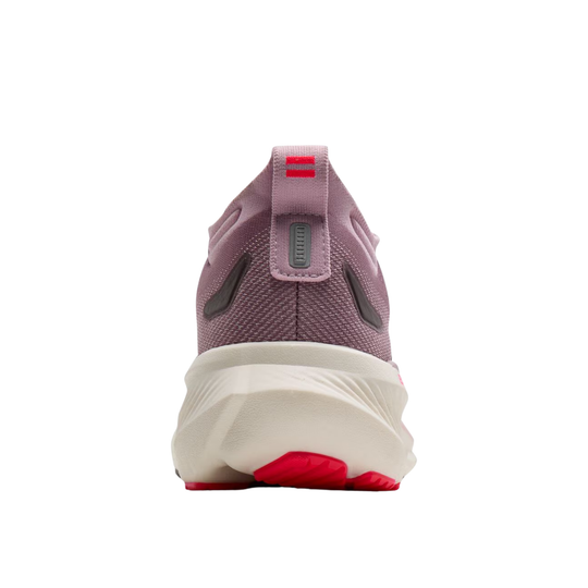 A single running shoe shown from the rear on a plain white background. The upper is a dusty mauve-purple mesh, with a thick cream-colored midsole and small red accents on the heel pull tab and outsole.