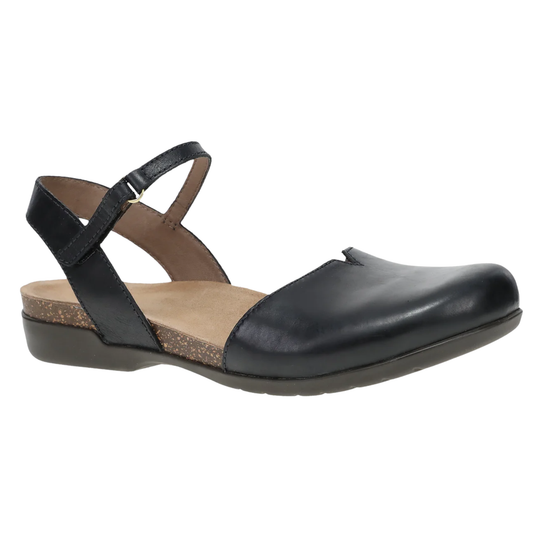 A single women's flat sandal with a black leather toe cap and straps, a brown cork-textured midsole, and a black wedge heel, shown against a plain white background.