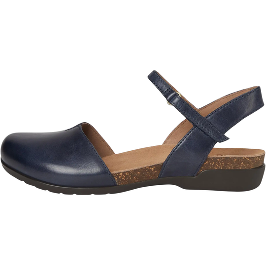 A navy blue leather Mary Jane sandal with a cork-look midsole and a black outsole, shown from a side profile on a white background.