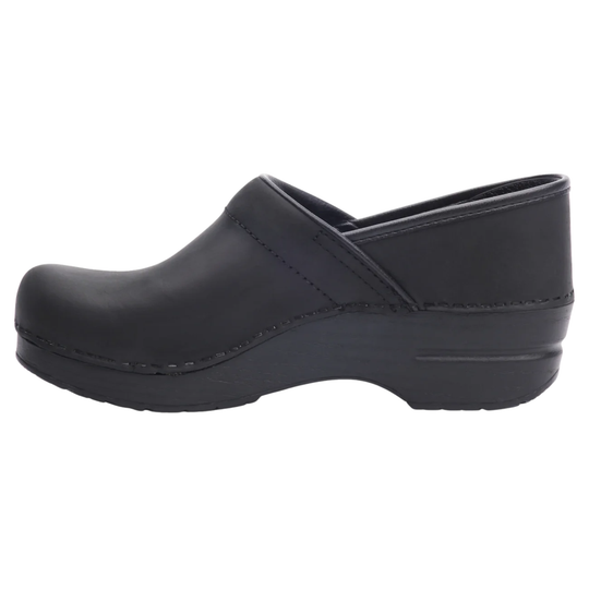 A single black slip-on clog shoe with a thick platform sole, shown in a side profile view against a plain white background.