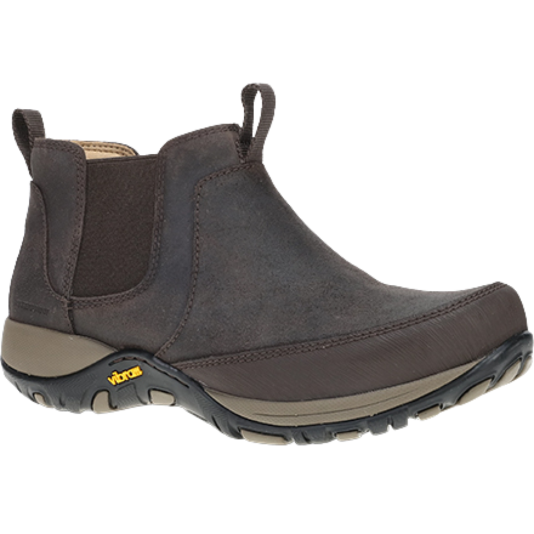 A dark brown ankle boot with a suede upper, elastic side panels, and a rugged sole featuring a visible Vibram logo, shown against a plain white background.