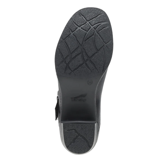 Close-up of a shoe sole with a brand logo on a white background