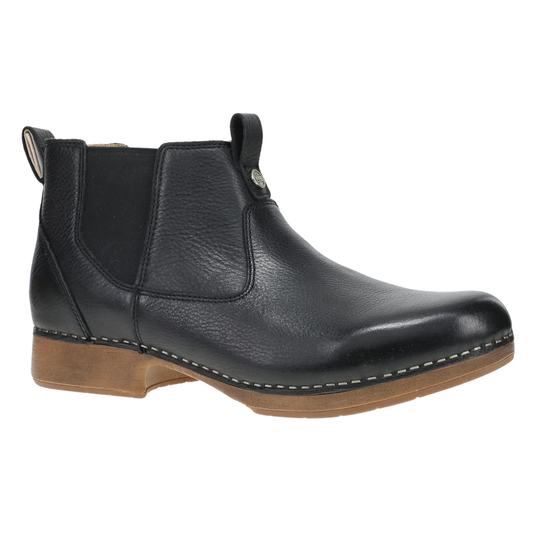 A black leather Chelsea ankle boot with a brown stacked sole, shown from a side profile on a white background.