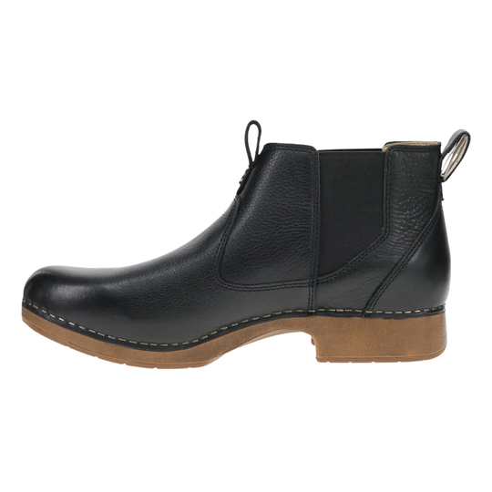 Black leather boot with brown sole on a white background